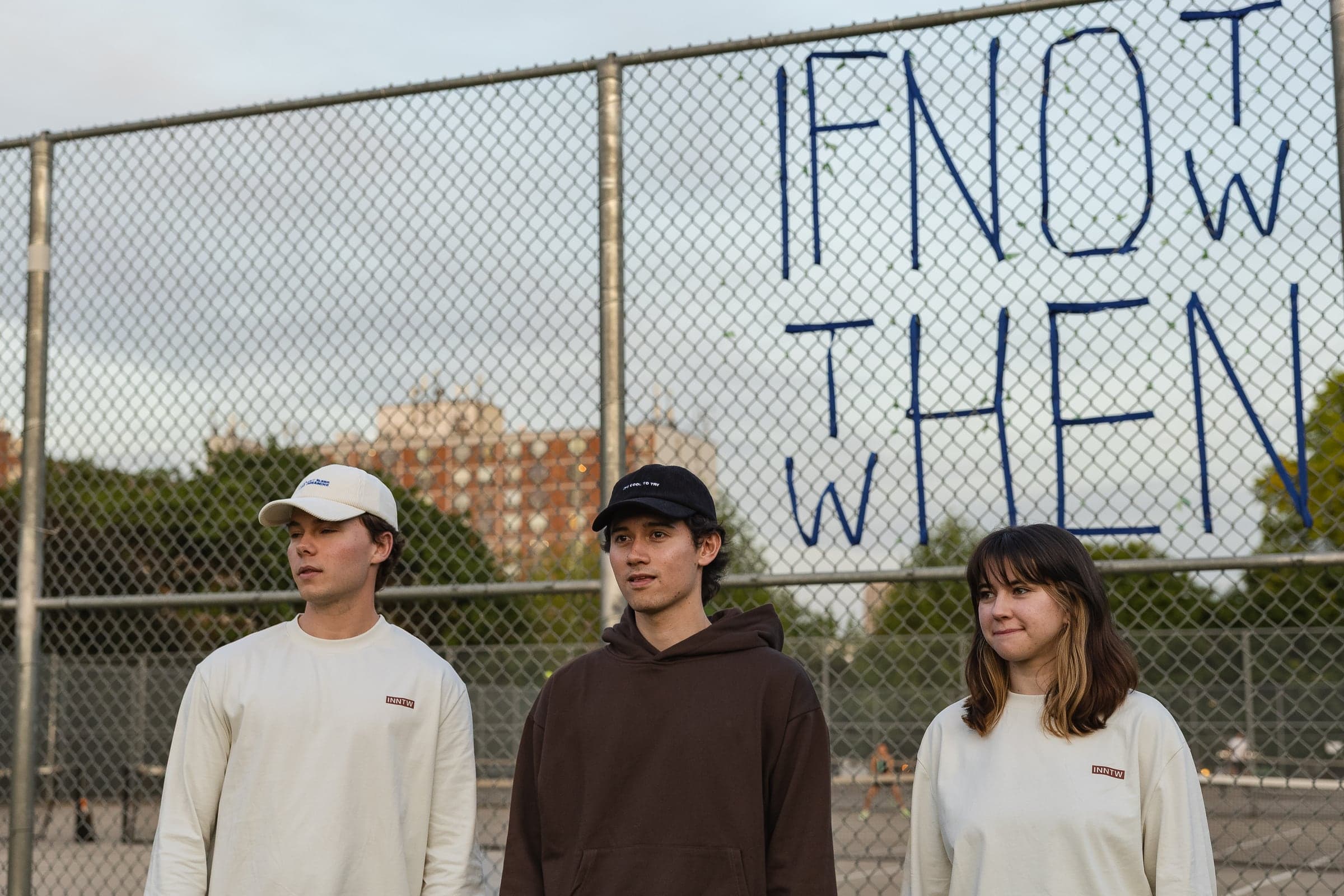 Three people in the first drop, the lockup drawn on a fence